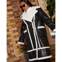 CHI CHI LONDON Plus Size Contrast Trim Belted Shearling Coat in Black