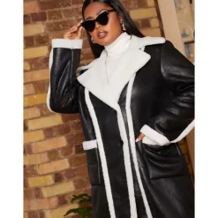 CHI CHI LONDON Plus Size Contrast Trim Belted Shearling Coat in Black