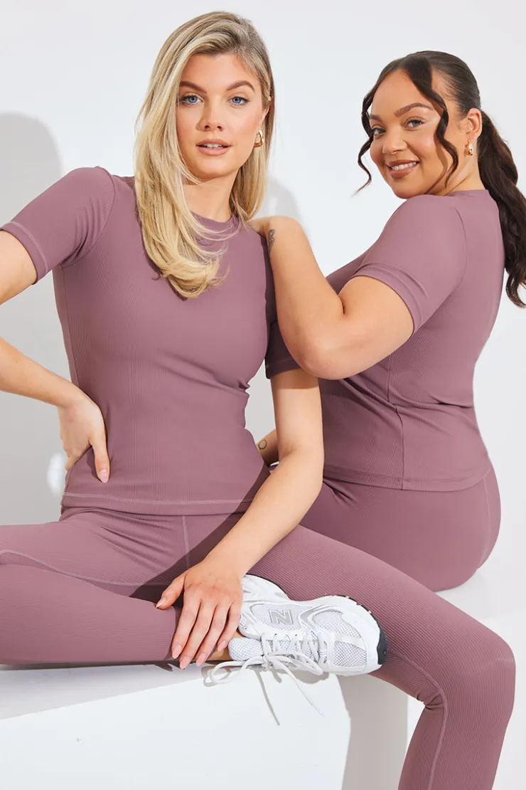Fits RIBBED CREW NECK SHORT SLEEVE TOP